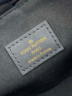 NOE PURSE 11.5 NANO CHARM BLACK CALFSKIN