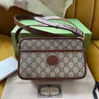 インターロッキングG 22 ベージュエボニーキャンバスとブラウンカーフスキントリムのバッグ