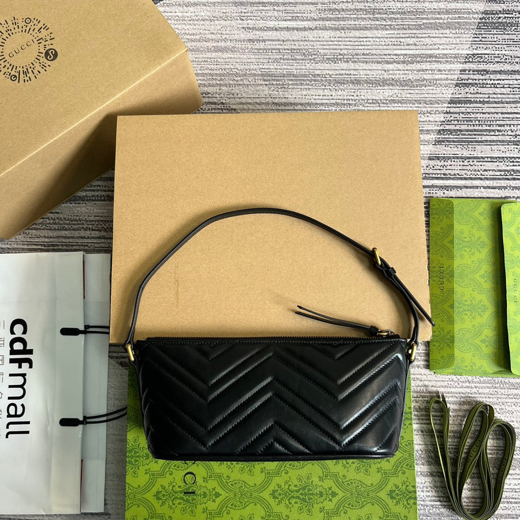 GGマーモント スモール 23 ハンドバッグ（ブラックカーフスキン、ゴールドロゴ入り）