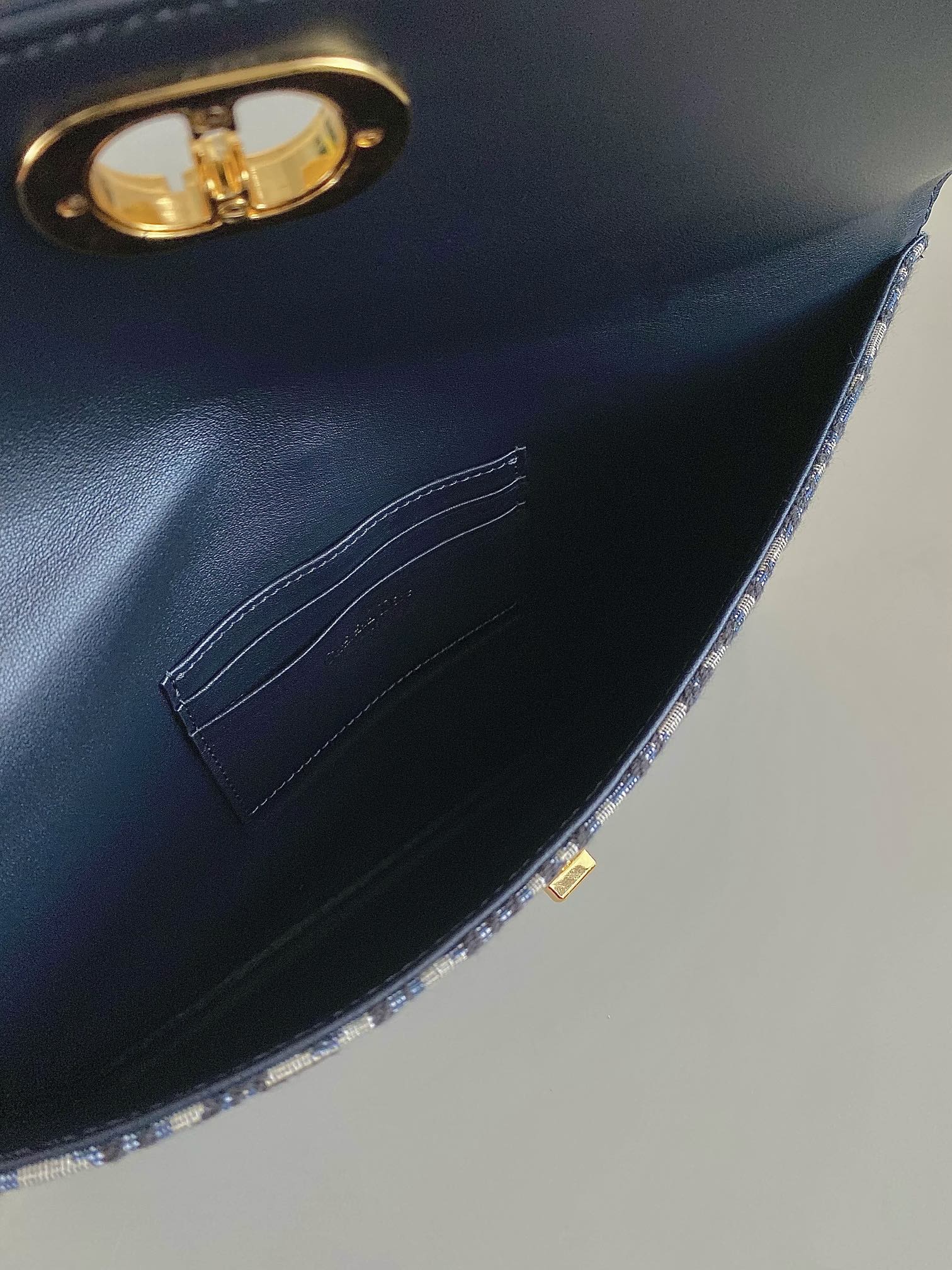 CD 30 ブルー オブリーク ジャカード クラッチバッグ