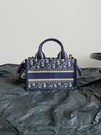 MINI BOOK TOTE 21 BLUE OBLIQUE EMBROIDERY