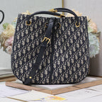 ブルーモノグラムオブリークジャカードのミディアム34ノリータバッグ