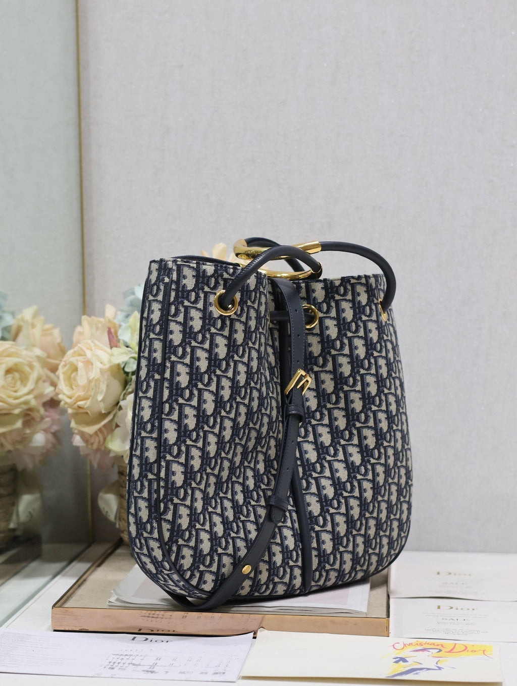 ブルーモノグラムオブリークジャカードのミディアム34ノリータバッグ