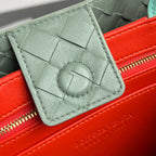 EAST WEST ANDIAMO BAG 29 IN ORANGE AND LIGHT GREEN CALFSKIN