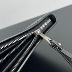 INTRECCIATO CLUTCH 32 IN BLACK SOFT CALFSKIN