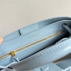BOTTEGA VENETA 25S SMALL ANDIAMO 25 IN LIGHT BLUE CALFSKIN AND RAFFIA