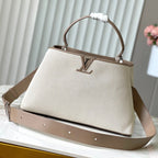 カプシーヌ スープル GM 38 ホワイトキャンバスとトープカーフスキントリム