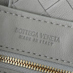 BV SMALL ANDIAMO 25CM GREY LAMBSKIN