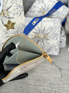 MONTAIGNE VOYAGEUR COIN PURSE 12 IN GREY MONOGRAM OBLIQUE JACQUARD