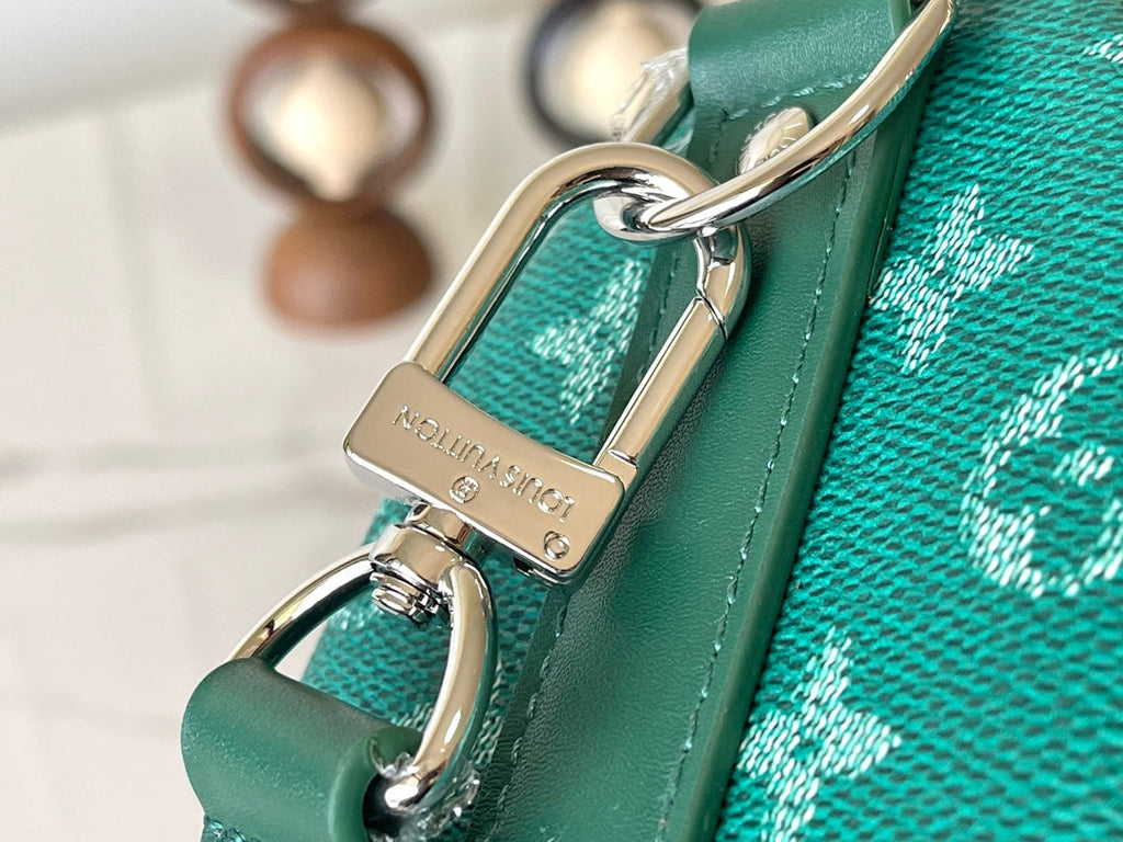 KEEPALL BANDOULIÈRE 25 IN GREEN MONOGRAM HERITAGE CANVAS
