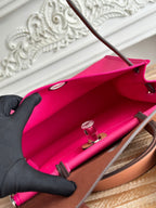 ZIP CABINE 31 BAG IN FUCHSIA PINK CANVAS AND BRONZE BROWN CALFSKIN