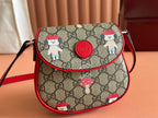 CHILDREN'S PRINTED GG SHOULDER BAG IN BEIGE AND DARK BROWN GG CANVAS RED TRIM