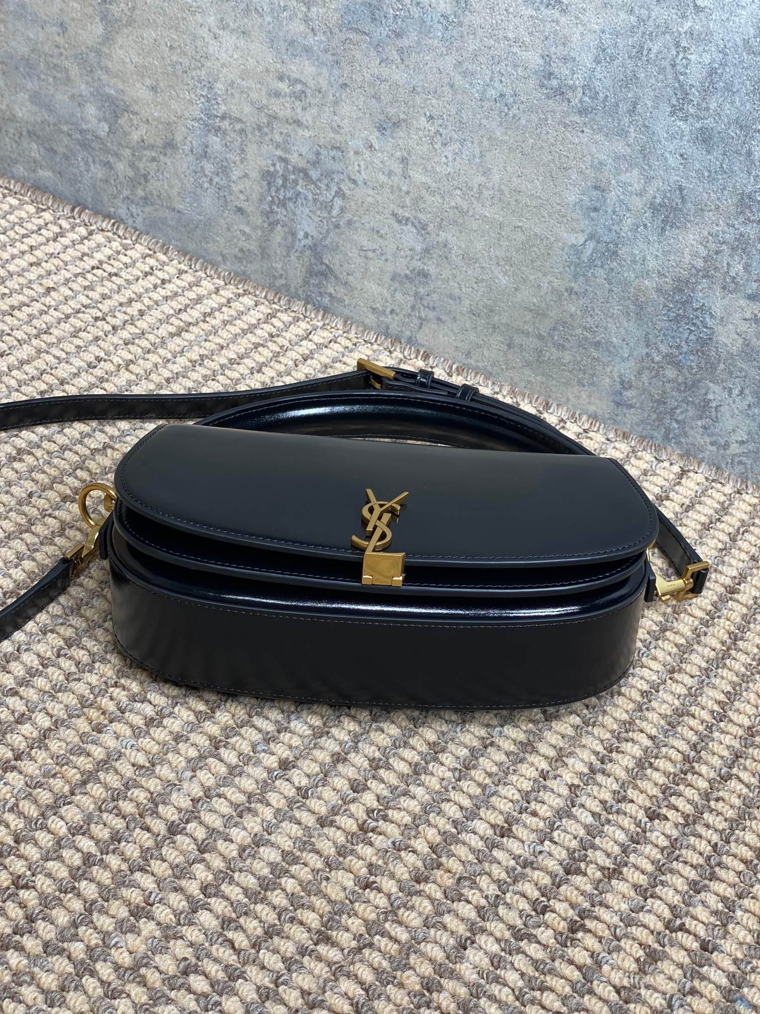 VOLTAIRE HALF-MOON SHOULDER BAG 24 IN BLACK CALFSKIN GOLD METALLIC