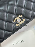 FLAP BAG 18 WITH HANDLE IN BLACK CALFSKIN GOLD HARDWARE