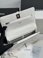 FLAP BAG WITH SILVER-TONE HANDLE 19 IN WHITE CAVIAR SKIN