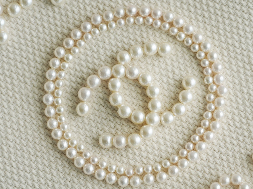 トートバッグ 39 パールロゴ付き ベージュキャンバス ゴールド金具