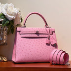 KELLY SELLIER 25 BAG IN DOLL PINK OSTRICH LEATHER WITH SILVER HARDWARE (MADE-TO-ODER)
