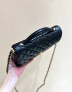 QUILTED FLAP BAG WITH HANDLE 26 IN BLACK LAMBSKIN GOLD PLATED METAL