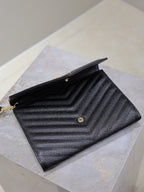 CASSANDRE CLUTCH 21 IN BLACK LAMBSKIN GOLD HARDWARE